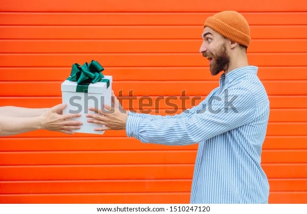 hands-unrecognizable-man-giving-gift-600w-1510247120.jpg copy.jpg